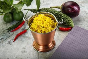 Indian cuisine - Lemon rice with spices photo