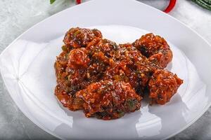 Chinese cuisine - Chicken manchurian gravy photo