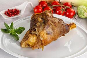 Baked Lamb shank with bone photo