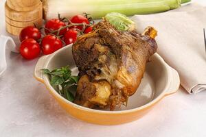 Baked Lamb shank with bone photo