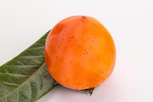 Fresh ripe sweet juicy persimmon photo