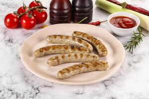 Grilled natural organick white sausages photo