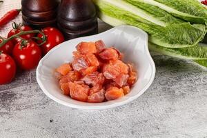 Salted salmon cubes for cooking photo