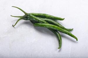 Hot and spicy green chili pepper photo