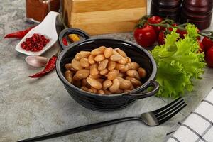 White canned beans in the bowl photo