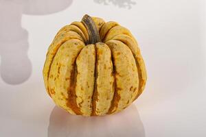 Decorative ripe Pumpkin isolated background photo