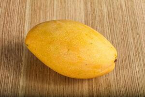 Sweet ripe juicy tropical mango fruit photo