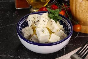 Greek traditional Feta cheese cubes photo