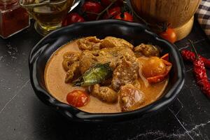 Thai Tom yum soup with chicken photo