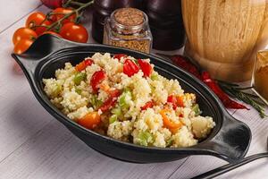 Vegan cuisine couscous with vegetables photo