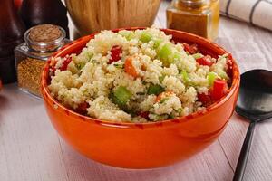 Vegan cuisine couscous with vegetables photo