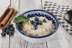 Oats porridge with blueberry photo