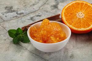 Tasty homemade Orange jam in the bowl photo