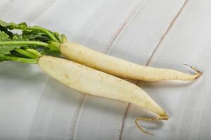 Raw ripe organic Daikon root photo