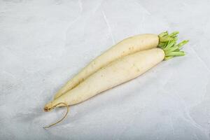 Raw ripe organic Daikon root photo