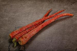Raw ripe Indian red carrot photo