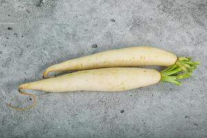 Raw ripe organic Daikon root photo