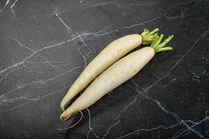 Raw ripe organic Daikon root photo