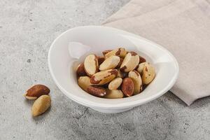 Brazil nut kernel in the bowl photo