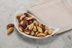 Brazil nut kernel in the bowl photo