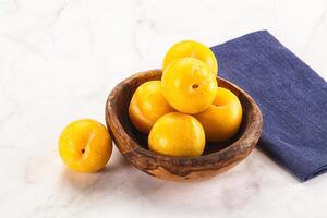 Ripe sweet and juicy Yellow Plums photo