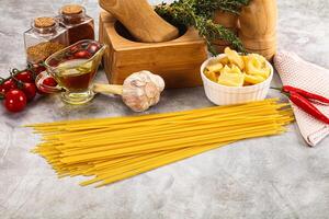 Raw dry Italian pasta - spaghetti photo