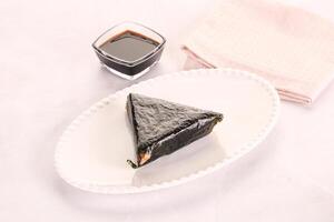 Japanese traditional onigiri with fish photo