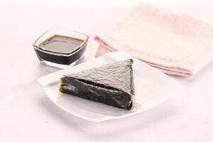 Japanese traditional onigiri with fish photo