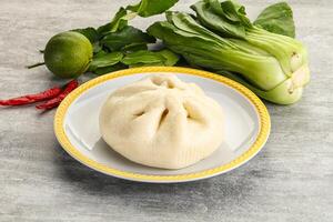 Chinese steamed bun Dim sum photo