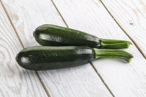 Sliced raw young green zucchini photo