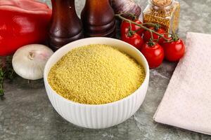 Raw dry wheat couscous grain photo