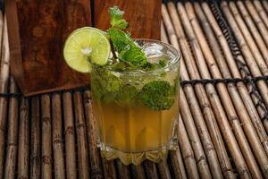 Mojito cocktail with lime and mint photo