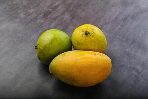 Fresh sweet and juicy mango heap photo
