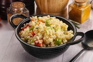 Vegan cuisine couscous with vegetables photo