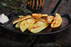 Baked Idaho potato with paprika photo