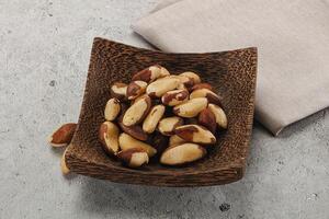 Brazil nut kernel in the bowl photo