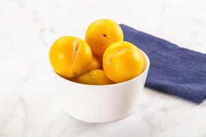 Ripe sweet and juicy Yellow Plums photo