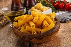 Italian cuisine - dry tortiglioni pasta photo