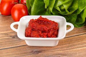 Tomato puree sauce for cooking photo