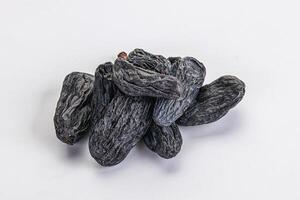 Blue raisin - dry grape berries photo