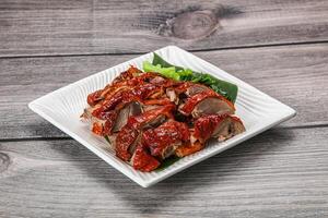 Asian cuisine - roasted duck with skin photo