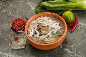 Vietnamese soup Pho Bo with beef photo