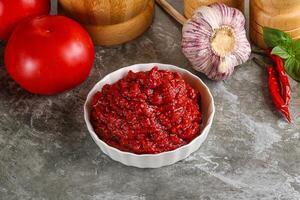 Natural organic red tomato paste photo