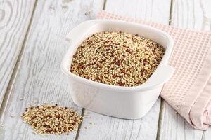 Raw dry quinoa cereal grain photo