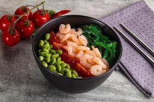 Hawaian cuisine - Poke with cocktail shrimps photo