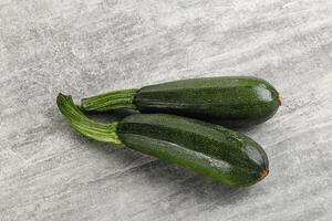 Sliced raw young green zucchini photo