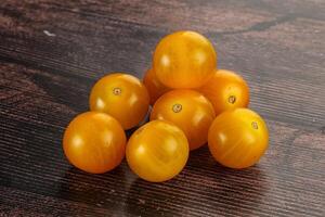 Ripe tasty yellow cherry tomato photo