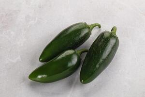 Raw green Mexican jalapeno pepper photo