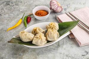 Chinese traditional steamed dumpligs momo photo