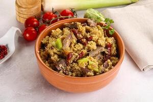 Bulgur with lamb and vegetables photo